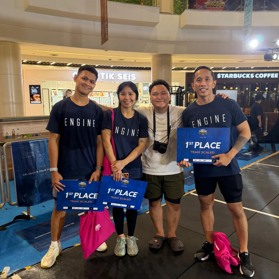 Team ENGINE with first-place boards